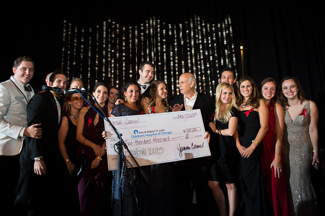 Donating a check to Lurie's Children hospital at Chicago during 2015 Snowball Fundraiser.