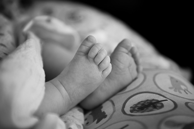 Tiny, adorable feet - black and white picture.