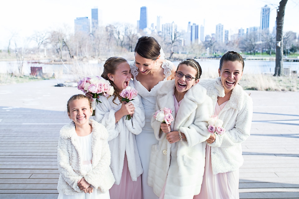 Bride and children laughing.